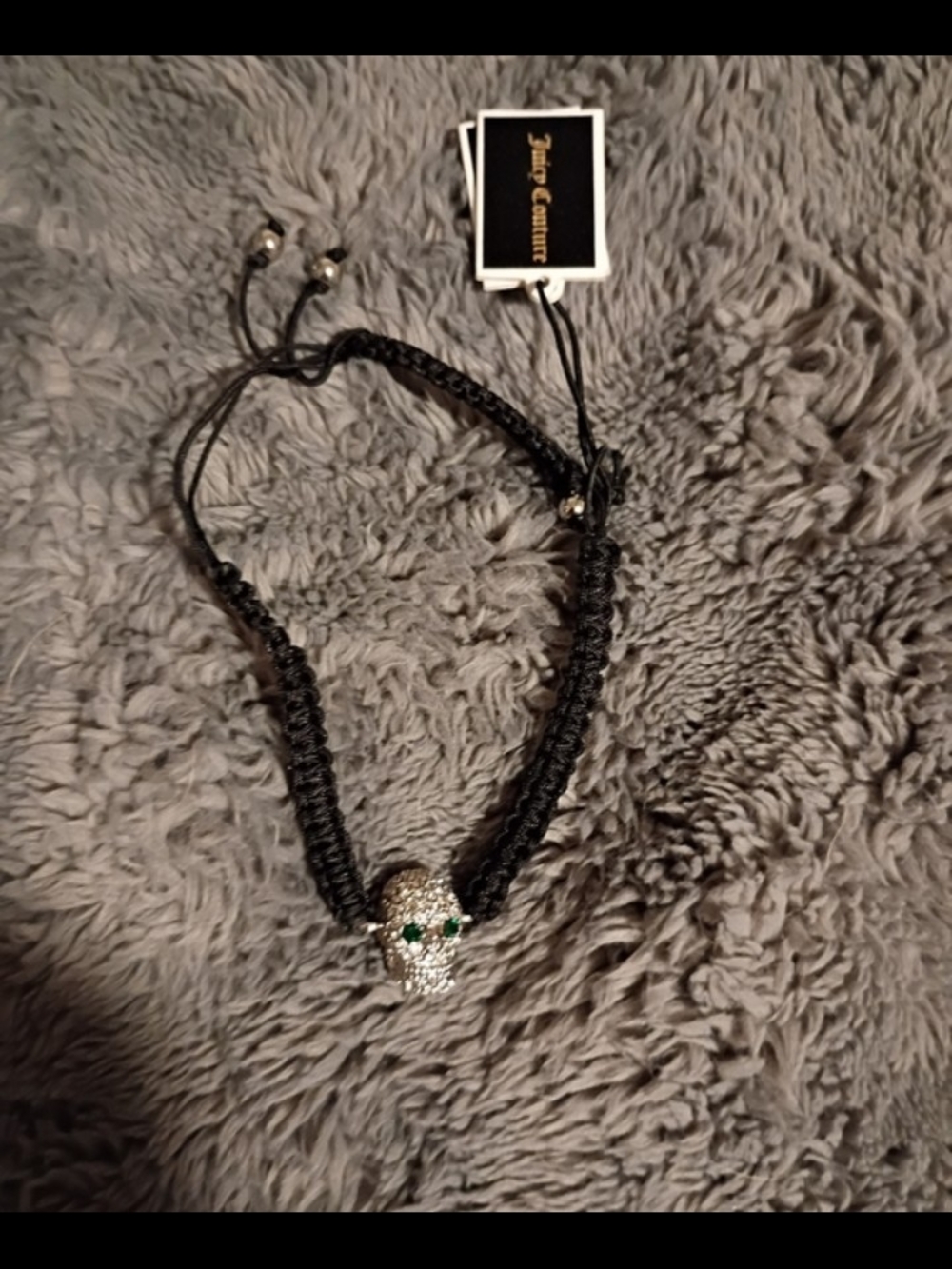 Juicy Couture Black Braided Bracelet with Crystal Skull and Green Eyes